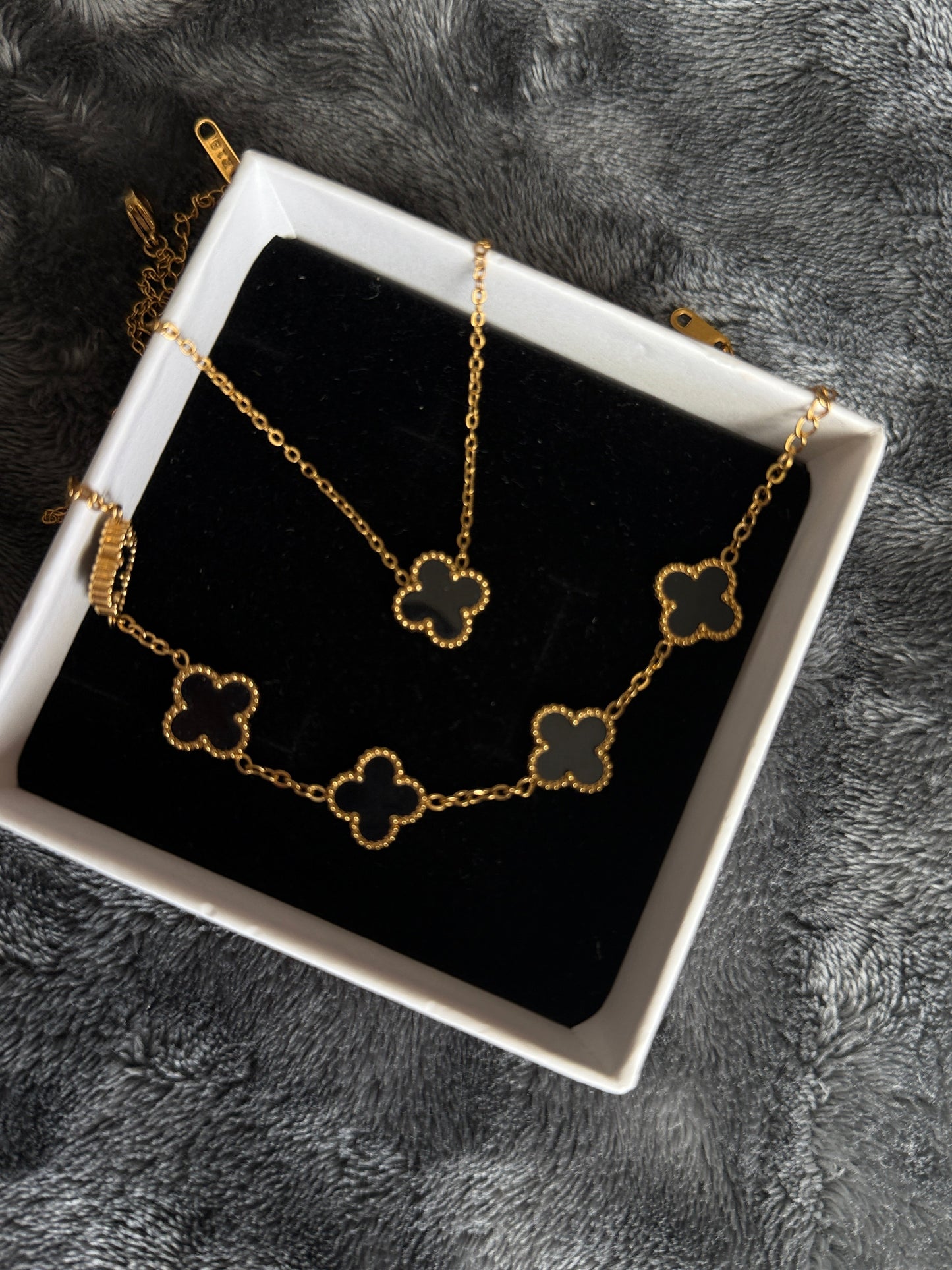 Black flower design necklace and bracelet gold plated